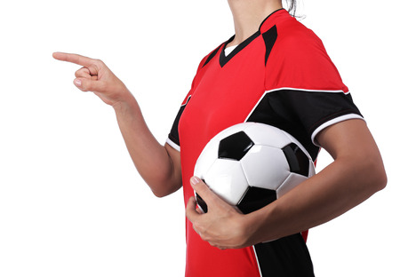 photography of a bust of a woman dressed in soccer finger pointing at somethingの写真素材