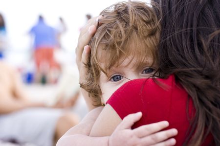 mom and daugther on the beach huggingの写真素材