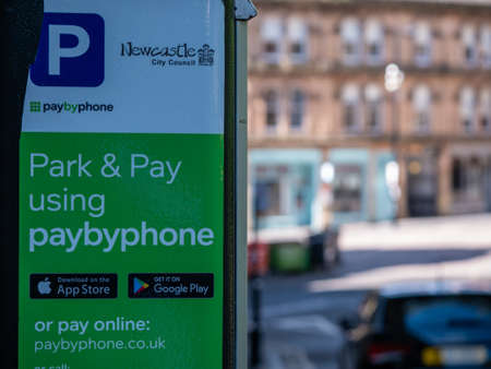 Park & Pay by phone sign on parking meter in Newcastle upon Tyneのeditorial素材