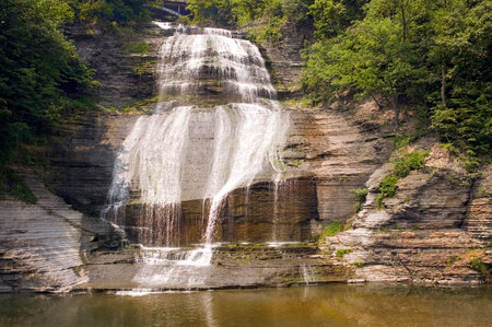 This large waterfall is located in a strange place. Its right at the end of main street in Montour Falls New York.の写真素材
