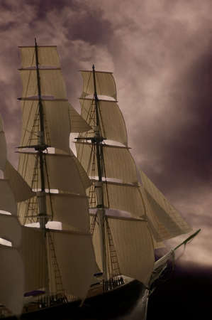 A tall ship sailing into stormy seas. Good concept photo for business.の写真素材