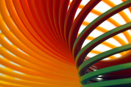 Close-up of a colorful spring toy. Shallow depth of field.の写真素材