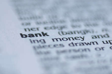 Extreme macro or close up of the word BANK. Very shallow depth of field is intentional and shows only the word bank in focus.の写真素材