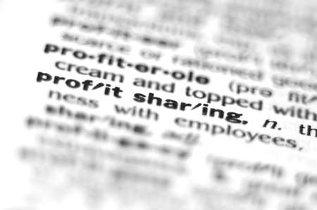 Extreme macro or close up of the word PROFIT SHARING. Very shallow depth of field is intentional and shows only the word profit sharing in focus.の写真素材
