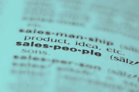 Extreme macro or close up of the word SALES PEOPLE. Very shallow depth of field is intentional and shows only the word sales people in focus.の写真素材