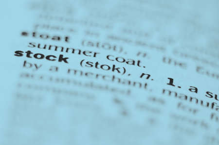 Extreme macro or close up of the word STOCK. Very shallow depth of field is intentional and shows only the word stock in focus.の写真素材