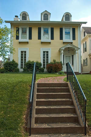 More of a mix of Federal and Colonial architecture  home. Nice inviting stairway leads you to the porch. This house is located in the historic Lancaster Ohio.の写真素材