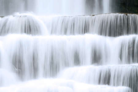 Colse up of a waterfall as the water is tumbling over its rock ledges. Taken with a slow shutter...