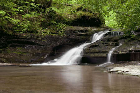 A small waterfall in the forests New Yorks Filmore Glen State Park. Taken with a slow shutter speed...