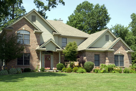 Beautiful red brick home featuring some beautiful classic brick details.の写真素材