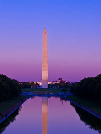 The Washington Monument at sunset reflecting into the pool. Located in Washington DC.の写真素材