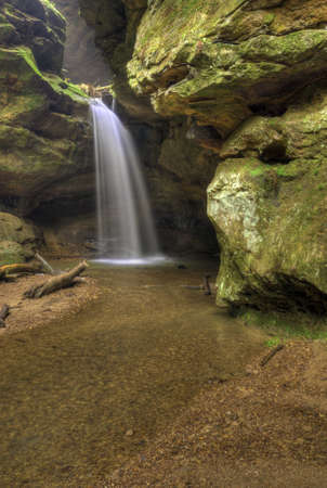 The spring rains bring waterfalls and fresh greens to  Conkle's Hollow in Hocking Hills Ohio.の写真素材
