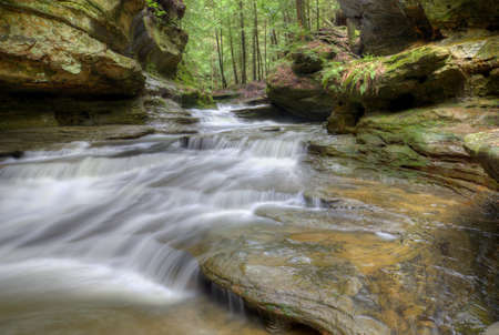 One of the many waterfalls at Old Man's Cave  in Hocking Hills Ohio. Very popular tourist atraction.の写真素材