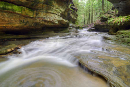 One of the many waterfalls at Old Man's Cave  in Hocking Hills Ohio. Very popular tourist atraction.の写真素材