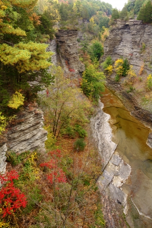 The deep gorge above Taughannock Falls   Located in Ulysses New York  Photo takne from an overlook during fall  Taughannock Falls is a gorgeous 215 foot waterfall found in the Finger Lakes region の写真素材