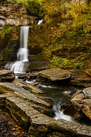 Cow Sheds falls in Filmore Glen New York during fall. A gorgeous waterfall found in the Finger Lakes region.の写真素材