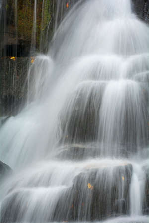 Eastatoe Falls is a beautiful 60 foot waterfall near Rosman North Carolina.Seen here in autumn. This...