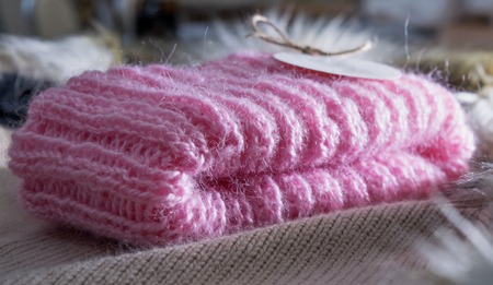 Warm and beautiful handmade pink winter hat for womenの写真素材