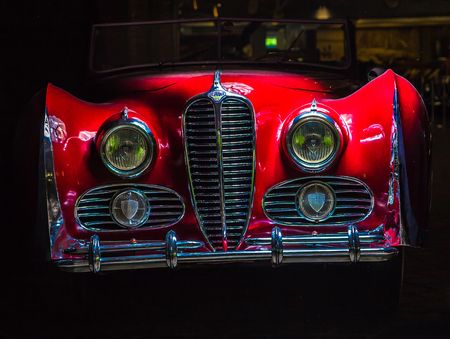 Delahaye 175 retoro car red color dark background Adler Trumpf Junior brown luxury retro car Cabrio Limousine dark backgroundのeditorial素材