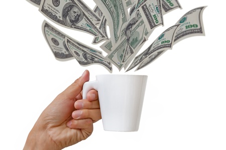 Coffee cup and dollar close upの写真素材