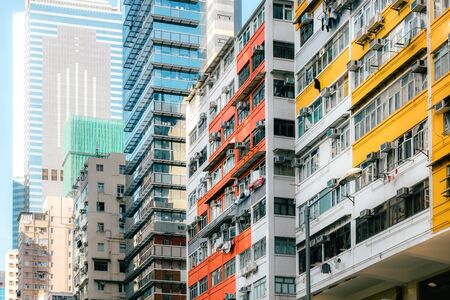 Dystopian Style Dense Asian Residential High-Rise Architecture in Summers Day, Hong Kongの写真素材