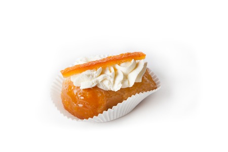 Sweet dessert cake with cream on white background