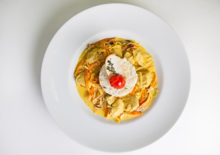 Yellow chicken curry with white  rice garnishの写真素材