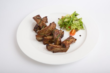 Fresh fried pork ribs with side salad