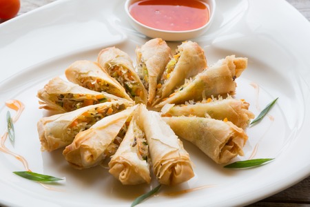 Vietnamese fried springroll served with chili sauce