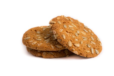 Pile of oat cookie with sunflower seedsの写真素材