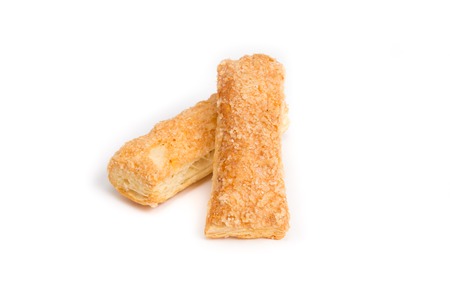 Baked stick on a white background with sugar covering
