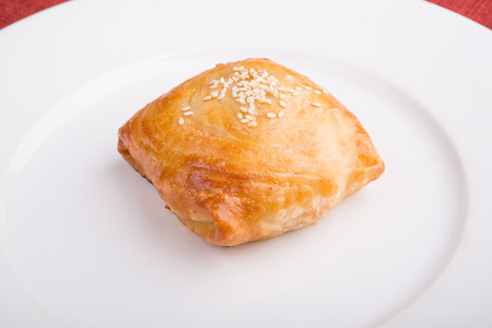 Fresh baked samosa on a white plateの写真素材