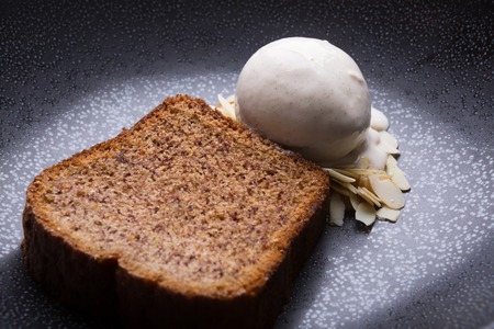 Almond ice cream served with banana cake