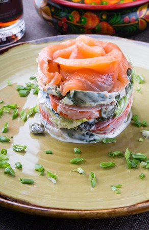 Salted salmon salad served with leek on a plateの写真素材