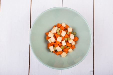 Carrot and green peas salad served in a bowlの写真素材