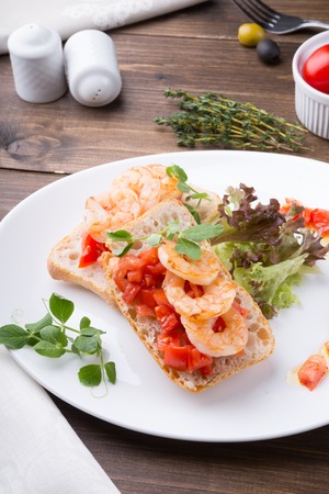 Bruschetta sandwich served on a plateの写真素材