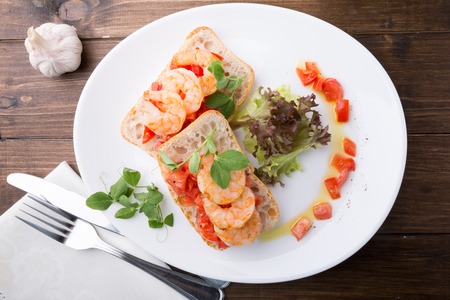 Bruschetta sandwich served on a plateの写真素材