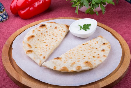 Traditional uzbek fried cheburek doughの写真素材