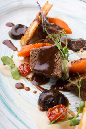 Beef salad served with waffles and vegetablesの写真素材