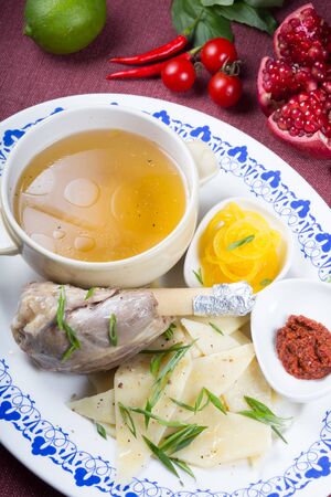 Asian nomadic soup set: meat, pasta and brothの写真素材