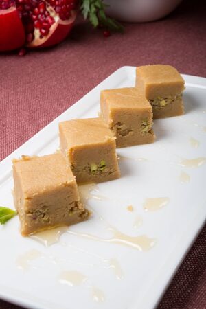 Indian brown milky desserts served on a plate