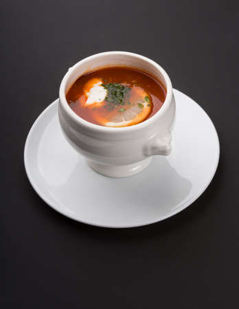 Traditional russian meat solyanka soup with sour creamの写真素材