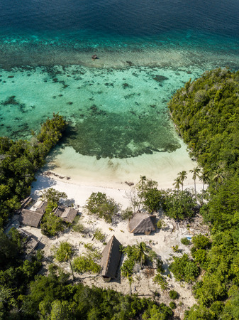 Beach bungalows on an island in Sulawesi, Indonesia