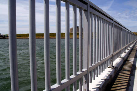 A fence leading into infinityの写真素材