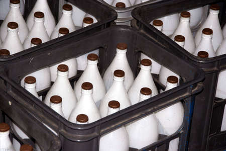 Milk bottles in cratesの写真素材