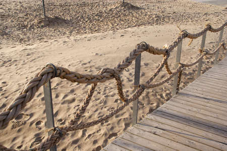 A fence made out of ropesの写真素材