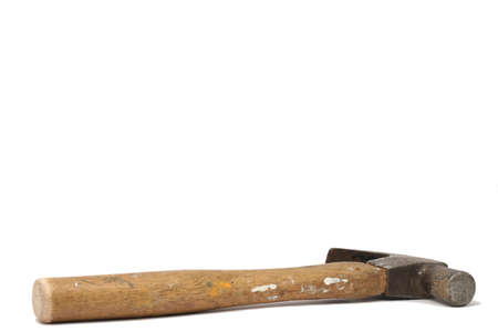 A very used hammer, paint spots all over handle, a bit of rust on the head; isolated one white backgroundの写真素材