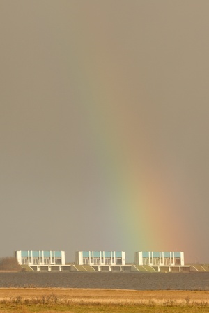 A rainbow in a grey sky at the floodworksの写真素材