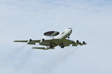 LEEUWARDEN,FRIESLAND,HOLLAND-SEPTEMBER 17  Boeing E-3 Sentry AWACS Plane makes flyby at the Airshow on september 17, 2011 at Leeuwarden Airfieldのeditorial素材