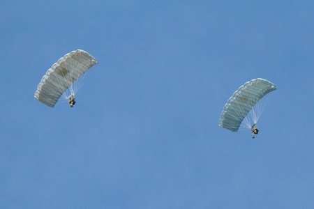 LEEUWARDEN,FRIESLAND,HOLLAND-SEPTEMBER 17  Two parachutists of the dutch army at the Airshow on September 17, 2011 at Leeuwarden Airfieldのeditorial素材